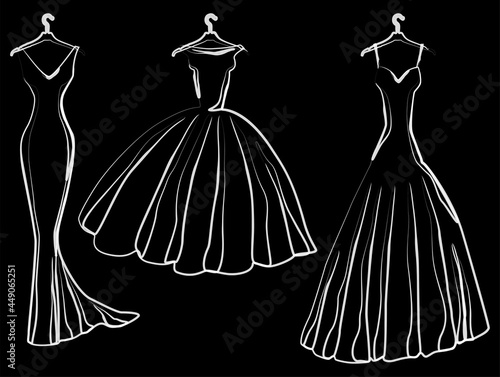Vector drawing of silhouettes evening female dresses