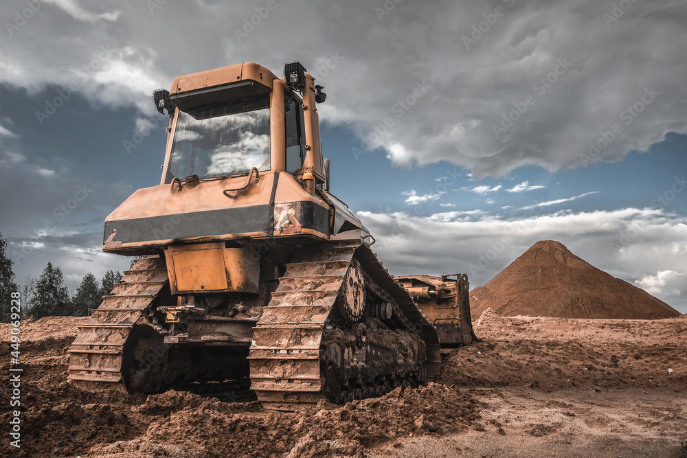 Bulldozer, earth mover. Road construction machinery. Bulldozer, earth mover. Road construction machinery.