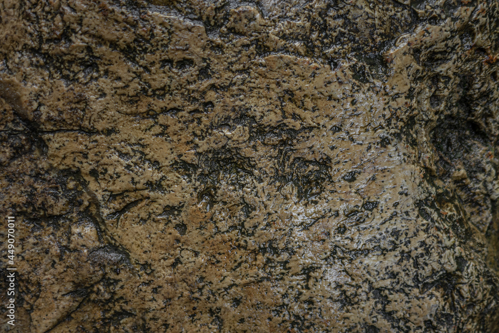 abstract background of wet stone texture close up