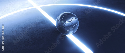 Blue futsal ball on futuristic glowing light beam in a dark black indoor soccer field background © Martin Piechotta
