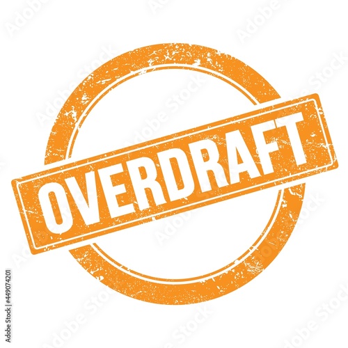 Fotografie OVERDRAFT text on orange grungy round stamp.