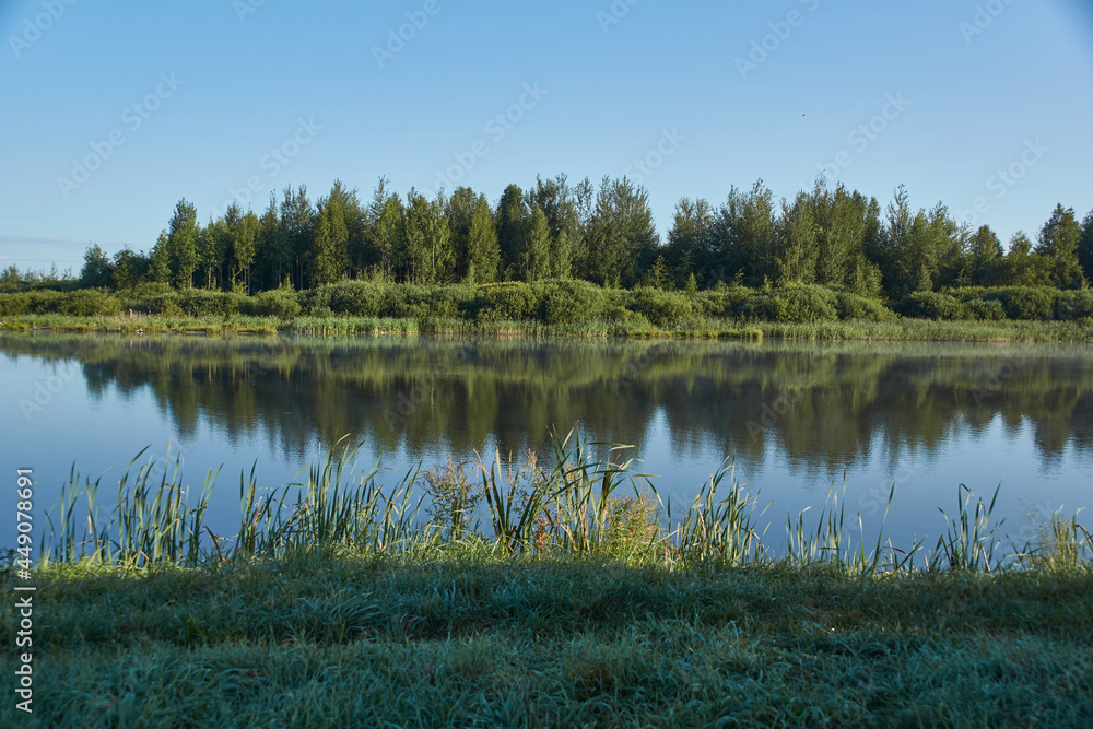 Fishing on the lake. Reflection in water. Recreation center. August 2021. Fishing on the lake. Reflection in water. Recreation center. August 2021.
