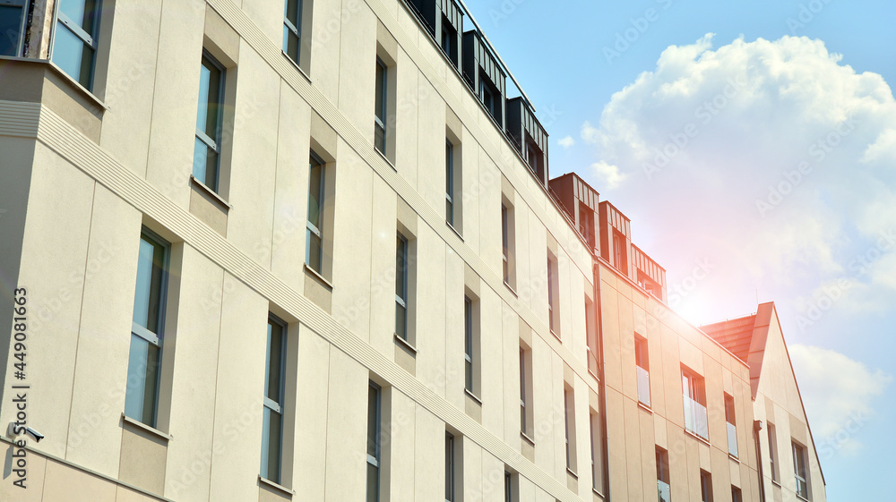Detailed view of modern townhouses in row of. Original townhouses in a residential area. Buildings predominantly made of glass, steel and concrete. Detailed view of modern townhouses in row of. Original townhouses in a residential area. Buildings predominantly made of glass, steel and concrete.