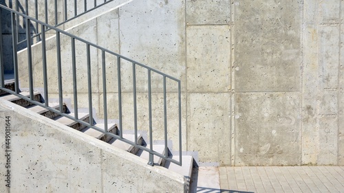 Fototapeta Naklejka Na Ścianę i Meble -  Modern concrete stairs and metal railings outside