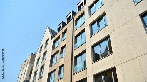 Detailed view of modern townhouses in row of. Original townhouses in a residential area. Buildings predominantly made of glass, steel and concrete.