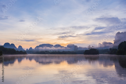 Ban Nong Thale the natural scenery of the sunshine in the morning (mountains, lakes, trees, fog), Thailand. © gamjai