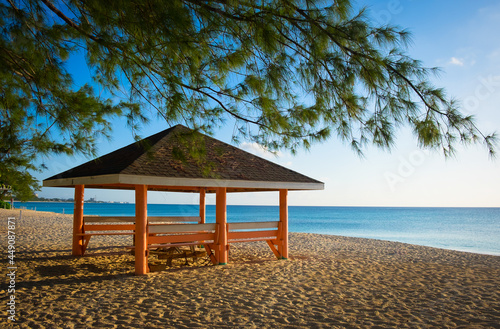 Orange wooden hut on Seven Mile Beach by the Caribbean Sea  Grand Cayman