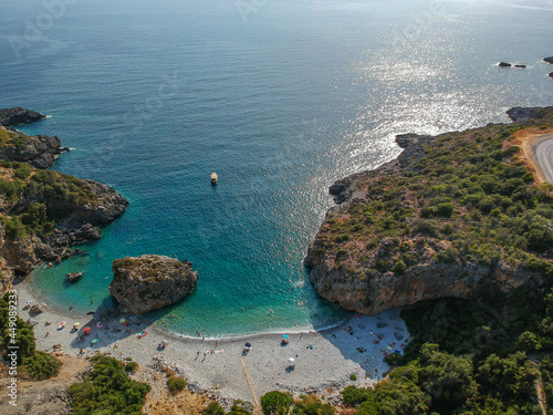 Aerial view of the famous rocky beach Foneas near Kardamyli village in the seaside Messenian Mani area during high tourist Summer period. Messenia, Peloponnese, Greece. photo
