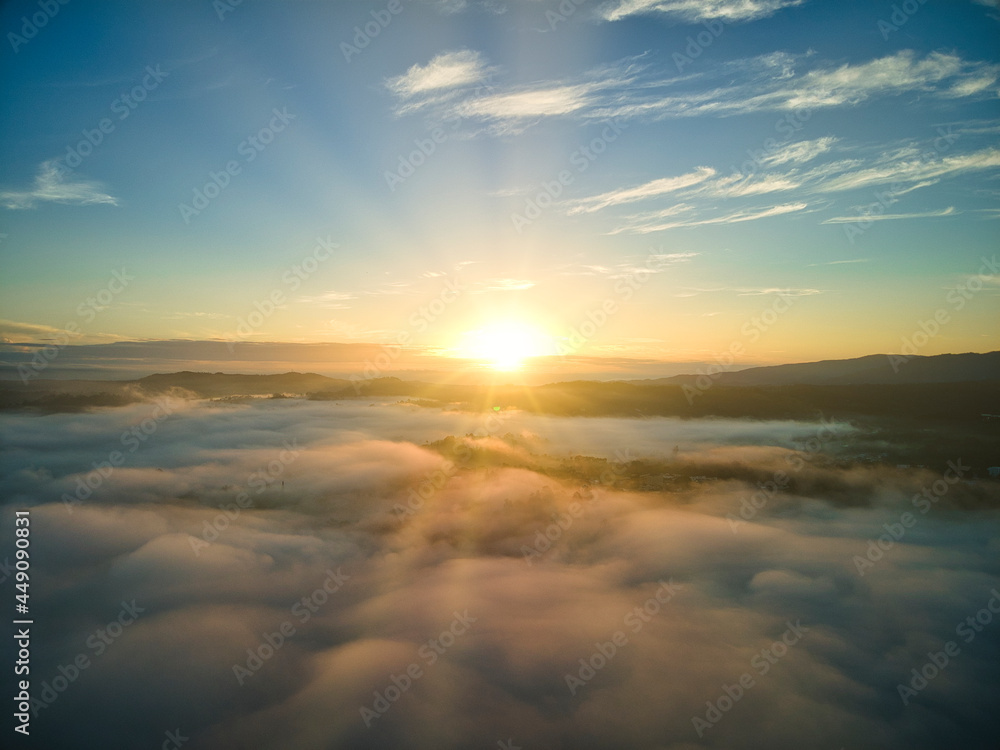 Fototapeta premium Morning full of fog in Jarabacoa, magic sunrise in Dominican Republic