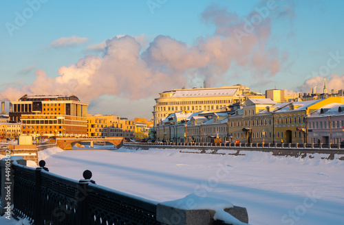 Winter view of snow covered historic Kadashevskaya Embankment along Vodootvodny Canal in center of Moscow on sunny day, Russia photo