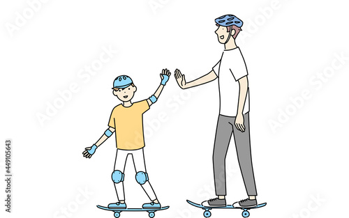 スケートボードに乗って父親とハイタッチする男の子