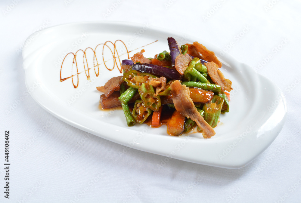 stir fried mixed vegetables with meat in spicy samba chilli sauce in white background asian halal menu stir fried mixed vegetables with meat in spicy samba chilli sauce in white background asian halal menu