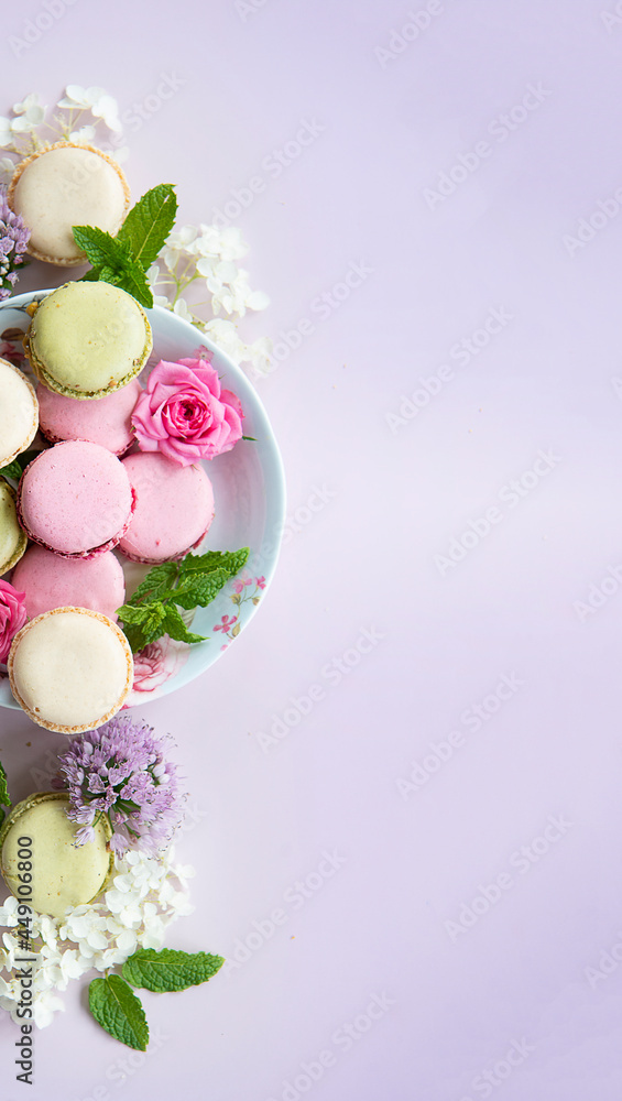 Macaroons on a plate with flowers Macaroons on a plate with flowers