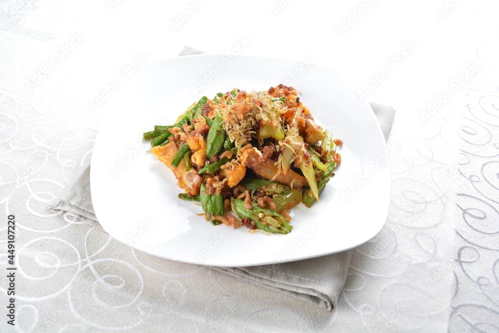 stir fried mixed vegetables with meat in spicy samba chilli sauce in white background asian halal menu stir fried mixed vegetables with meat in spicy samba chilli sauce in white background asian halal menu