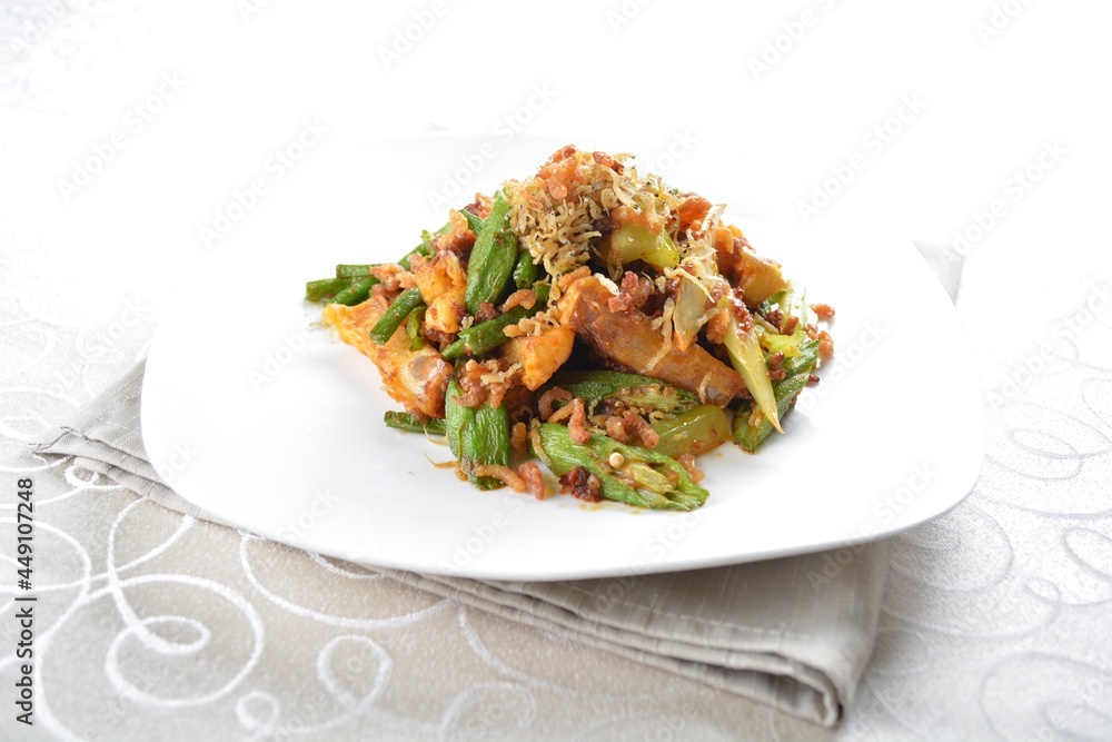 stir fried mixed vegetables with meat in spicy samba chilli sauce in white background asian halal menu stir fried mixed vegetables with meat in spicy samba chilli sauce in white background asian halal menu