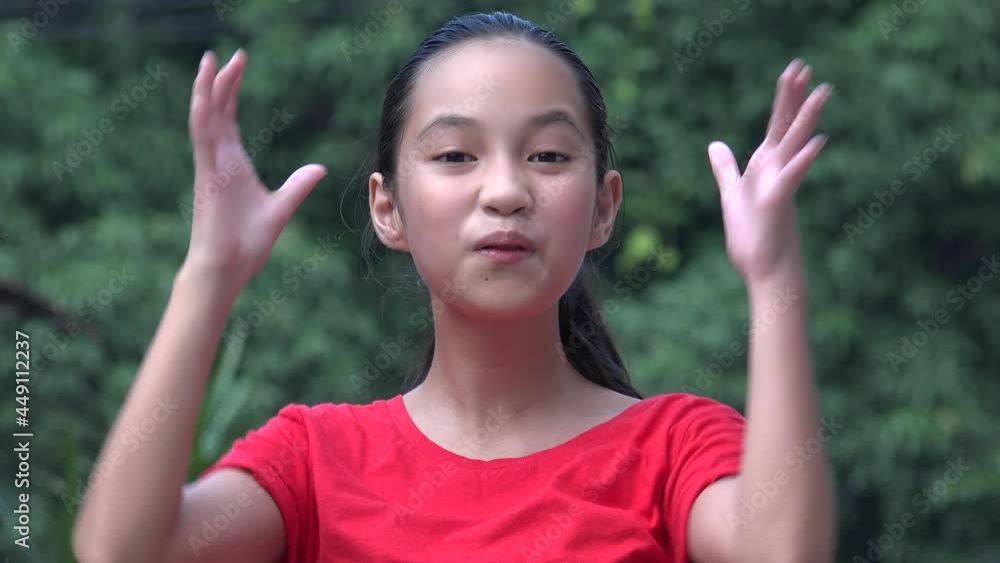 An Asian Teen Girl Funny Faces