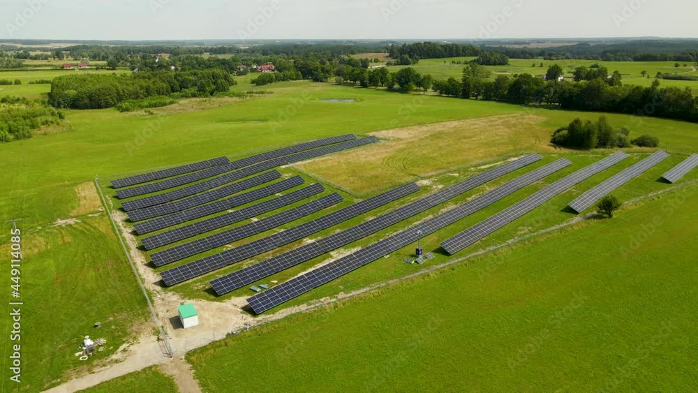Photovoltaic Cells Farm On Countryside Village Near Zielenica In Northern Poland. - Aerial Drone Shot Photovoltaic Cells Farm On Countryside Village Near Zielenica In Northern Poland. - Aerial Drone Shot