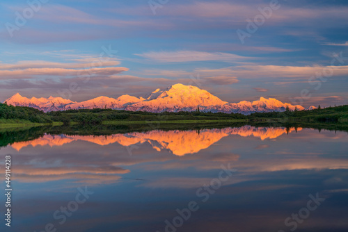 alaska s mount denali reflected in calm Reflecting Pond near Wonder Lake sunset