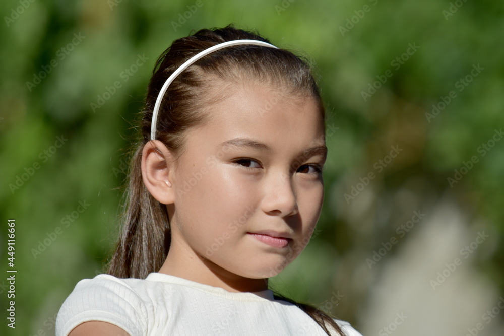 A Serious Young Philippina Female Outside A Serious Young Philippina Female Outside