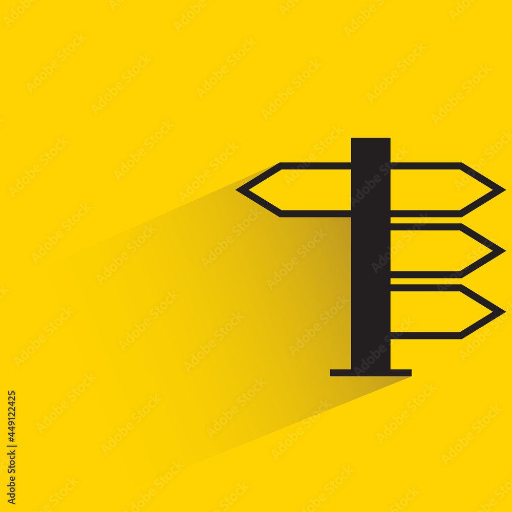 Obraz premium street signpost and signage with shadow on yellow background