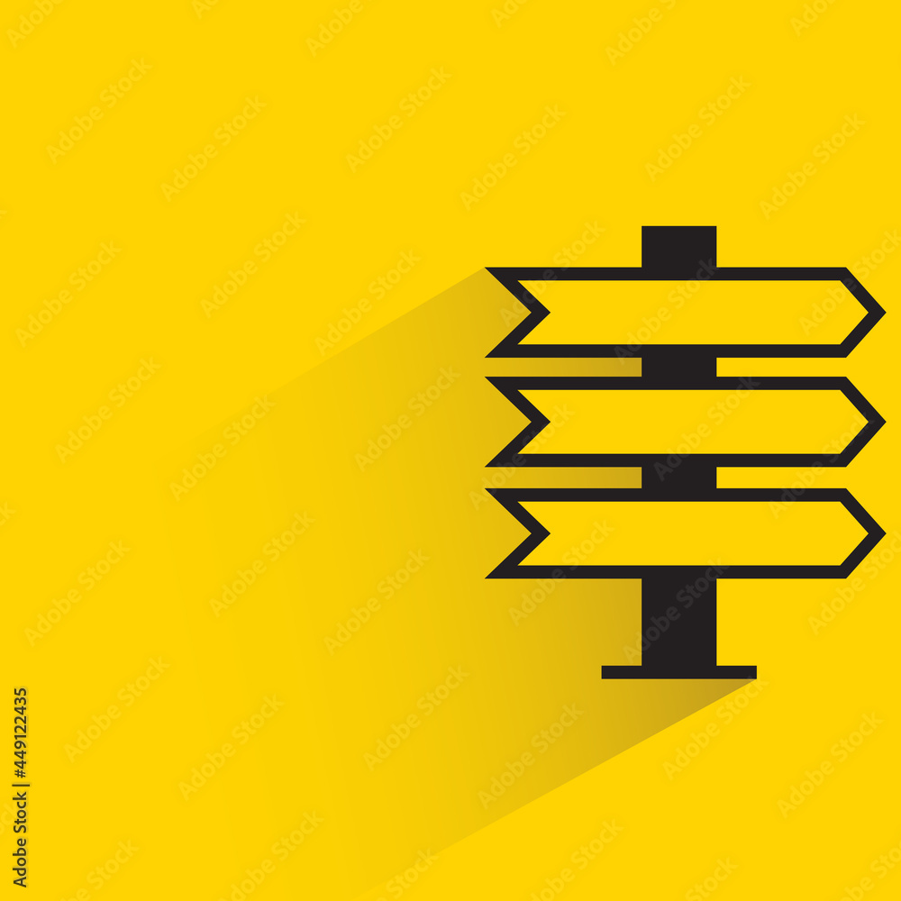 street signpost and signage with shadow on yellow background street signpost and signage with shadow on yellow background