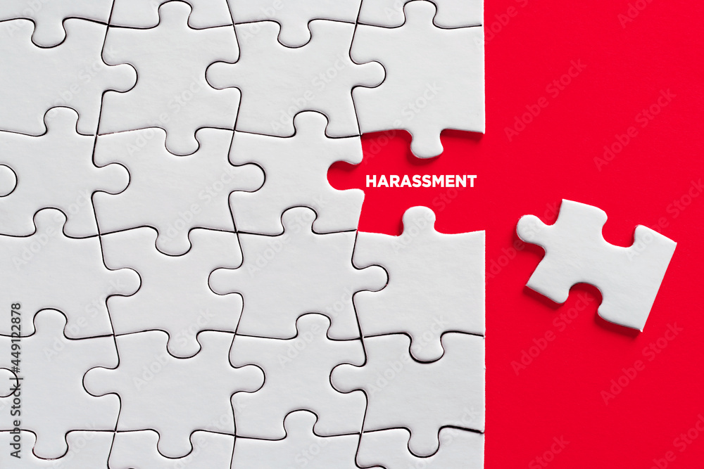 To reveal or expose harassment concept. The word harassment written on missing puzzle piece To reveal or expose harassment concept. The word harassment written on missing puzzle piece