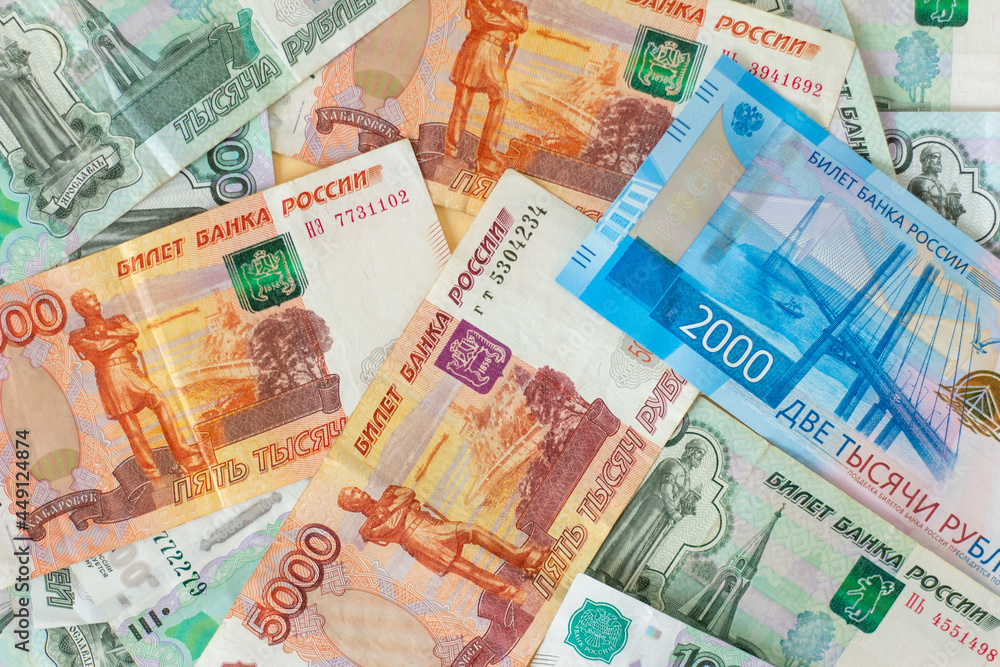 Banknotes in Russian Rubles. The ruble is the currency of Russia.Russian money in denominations of 1000,2000 and 5000 rubles. Banknotes in Russian Rubles. The ruble is the currency of Russia.Russian money in denominations of 1000,2000 and 5000 rubles.