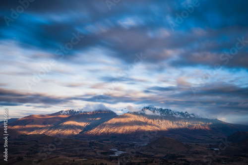 Long exposure of cloud passing over the top of the Remarkables, Wakatipu Basin, Queenstown, New Zealand