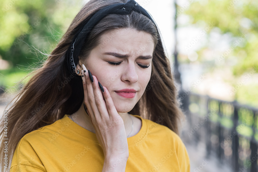 Portrait of a Caucasian teen girl who has a toothache. Healthcare. Medicine. Portrait of a Caucasian teen girl who has a toothache. Healthcare. Medicine.
