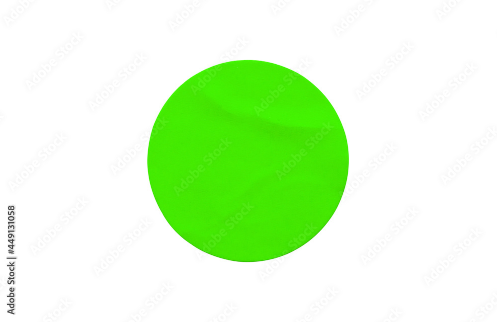 Green round paper sticker label isolated on white background