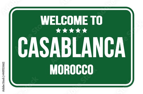 WELCOME TO CASABLANCA - MOROCCO, words written on green street sign stamp © outchill
