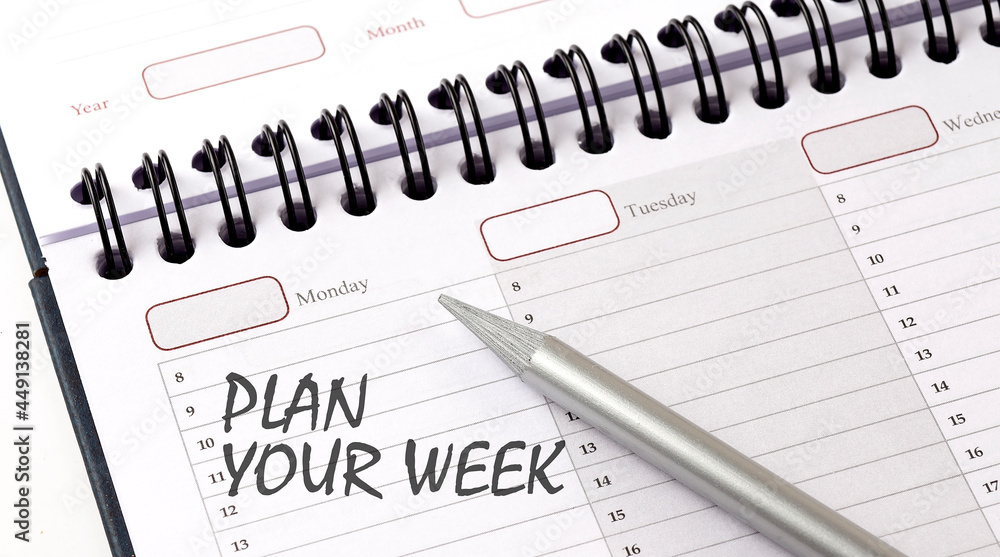 PLAN YOUR WEEK on the planner with pencil PLAN YOUR WEEK on the planner with pencil
