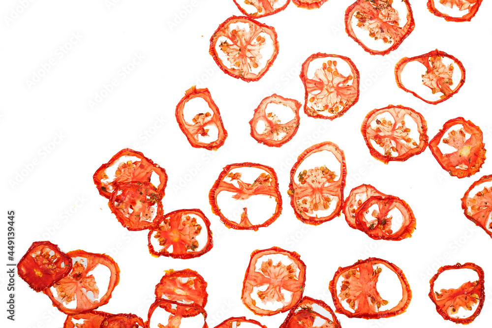 Dried or sundried thin tomato slice or chips isolated on Dried or sundried thin tomato slice or chips isolated on