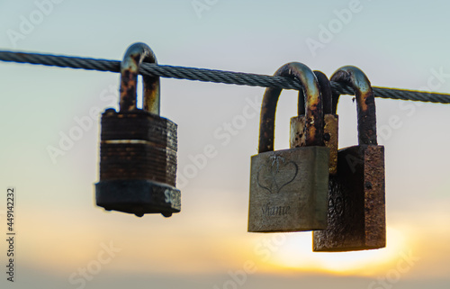 Padlocks at sunset photo