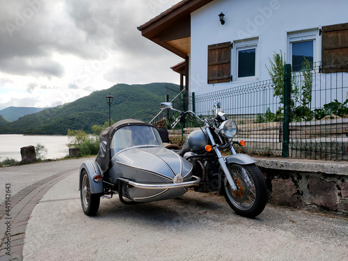Camino de Santiago, city of Eugui Navarra, Lake Eugui, Basque house and old motorcycle with sidecar, summer 2021