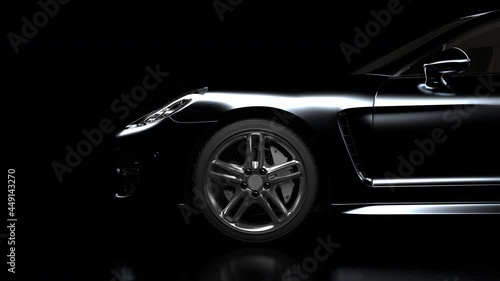 the black car gradually emerges from the darkness due to the illumination and disappears again in the darkness. fragment side view