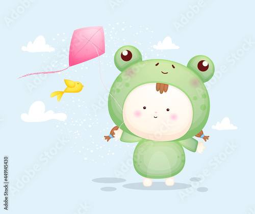 Cute baby in frog costume playing kites. Mascot cartoon illustration Premium Vector