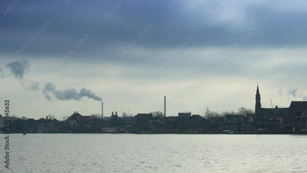 Dutch wooden houses and old industry near Amsterdam Dutch wooden houses and old industry near Amsterdam