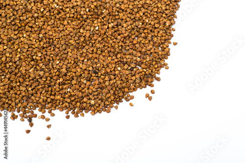 Pile of buckwheat isolated on white background. Top view. Buckwheat. Buckwheat grains. Grain culture.