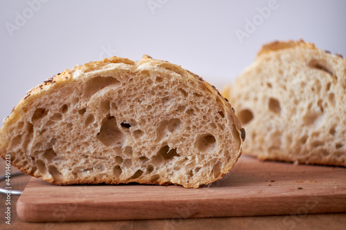 homemade bread. The sourdough bread. Side View. Wooden and white background. rustic.