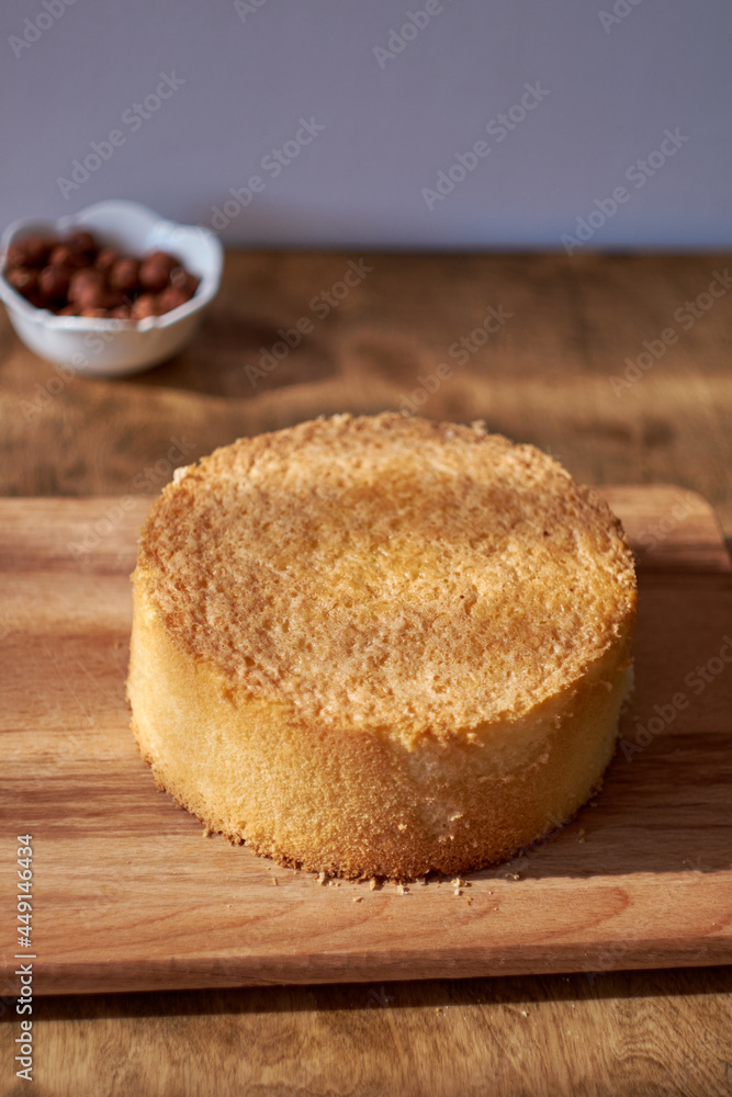 Sponge cake on a wooden table.