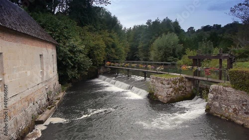 River and waterfall in Broglie, Normandy France photo