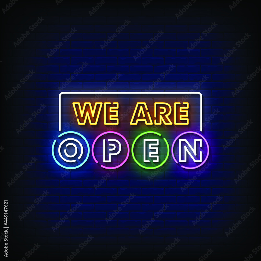 Obraz premium We are Open Neon Signboard On Brick Wall
