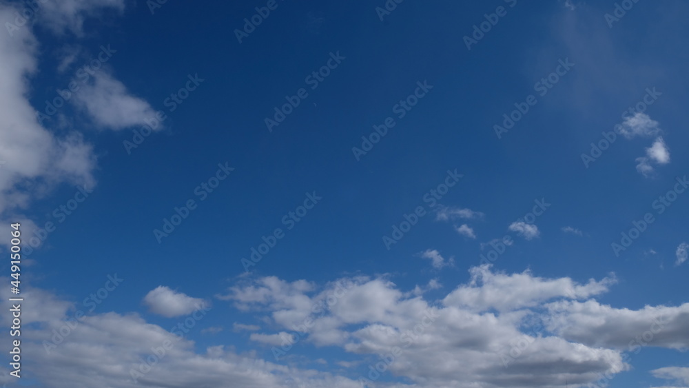 Frame of Beautiful blue sky with clouds background. Sky clouds. Air and fluffy clouds in the blue sky on a sunny day, background texture. Copy space. The concept of hope.