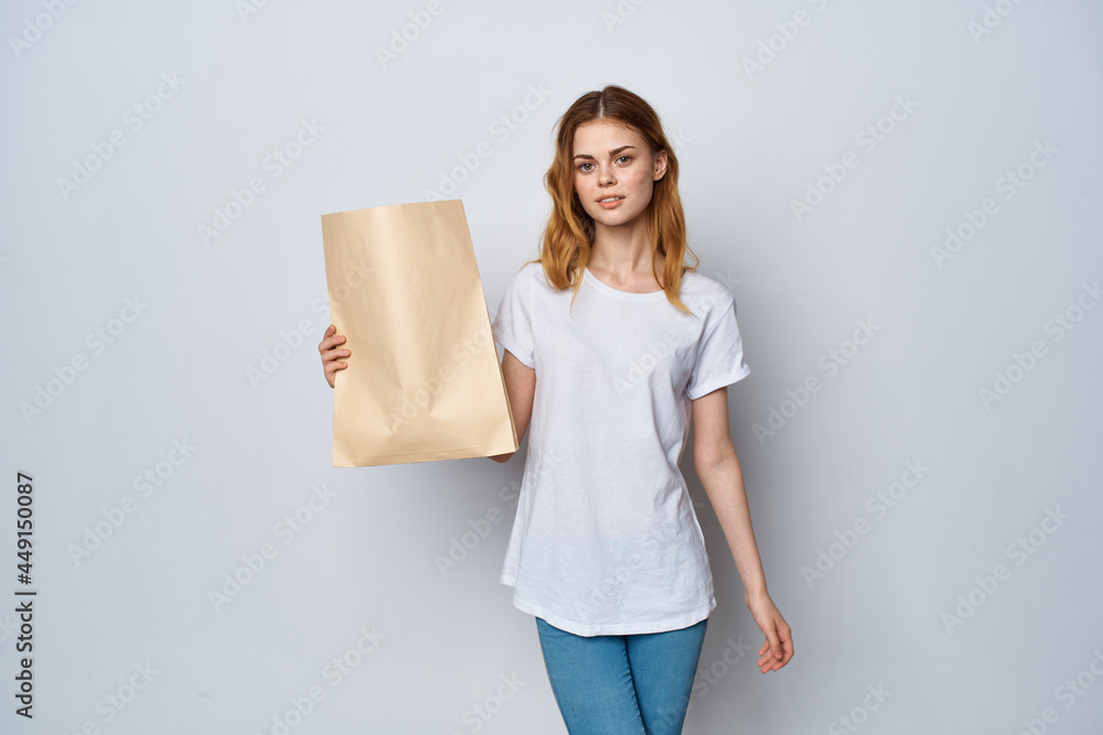 woman with paper bag in hands Shopaholic fashion shopping woman with paper bag in hands Shopaholic fashion shopping