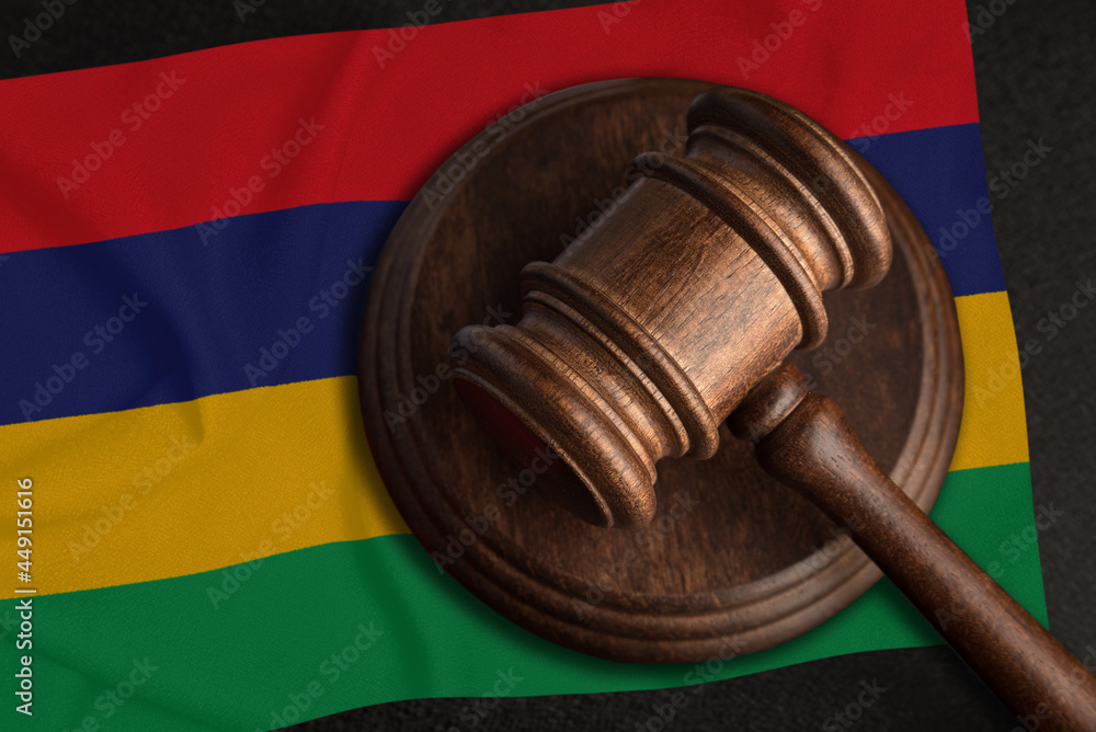 Judge Gavel and flag of Mauritius. Law and justice in Mauritius. Violation of rights and freedoms
