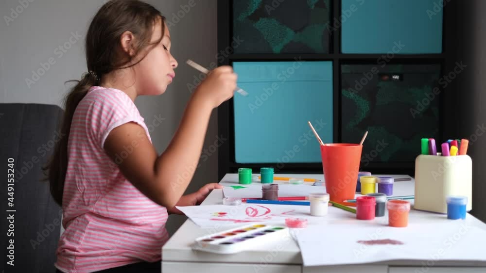 4k. little cute caucasian girl drawing at home 4k. little cute caucasian girl drawing at home