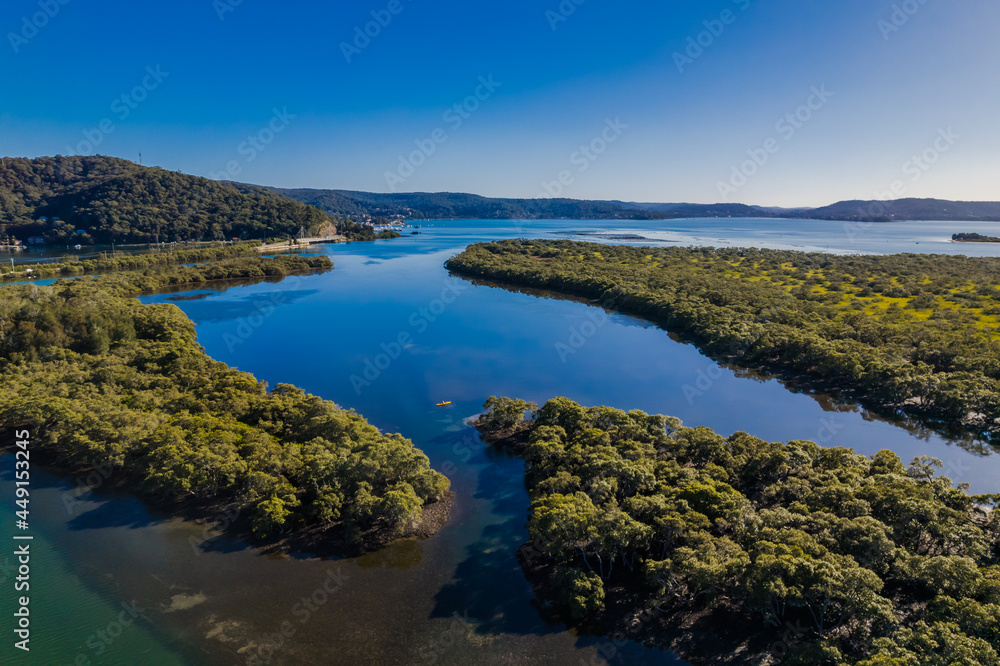 Morning aerial waterscape over the channel with clear skies