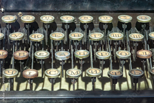 Closeup vintage typewriter keys, selective focus