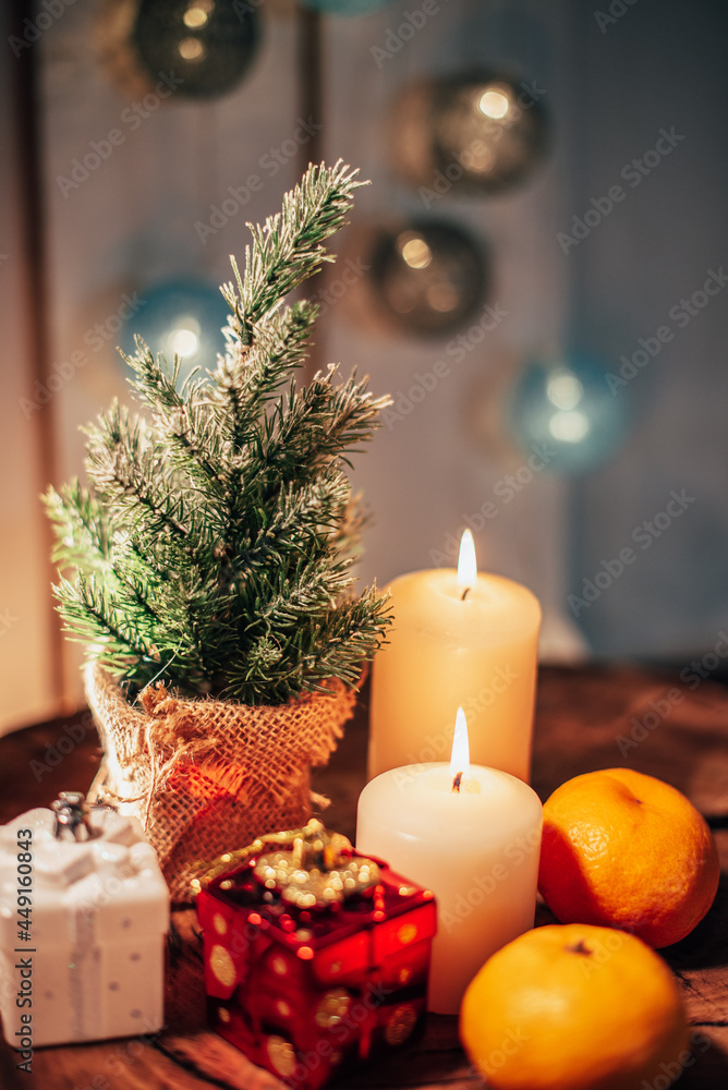Christmas decor with candles and gifts